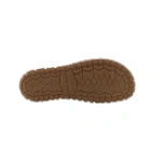 Suela de goma color caramelo del Coqueflex Lira Negro con dibujo antideslizante y la marca grabada en el centro