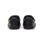 Zapatillas infantiles Mustang Free Murri en azul marino vistas por detrás, con logo en el talón y cierre de velcro