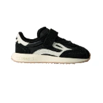 Zapatilla infantil Lejan Melrose Kids Noir negra con detalles y suela color crema y tira adherente, vista lateral